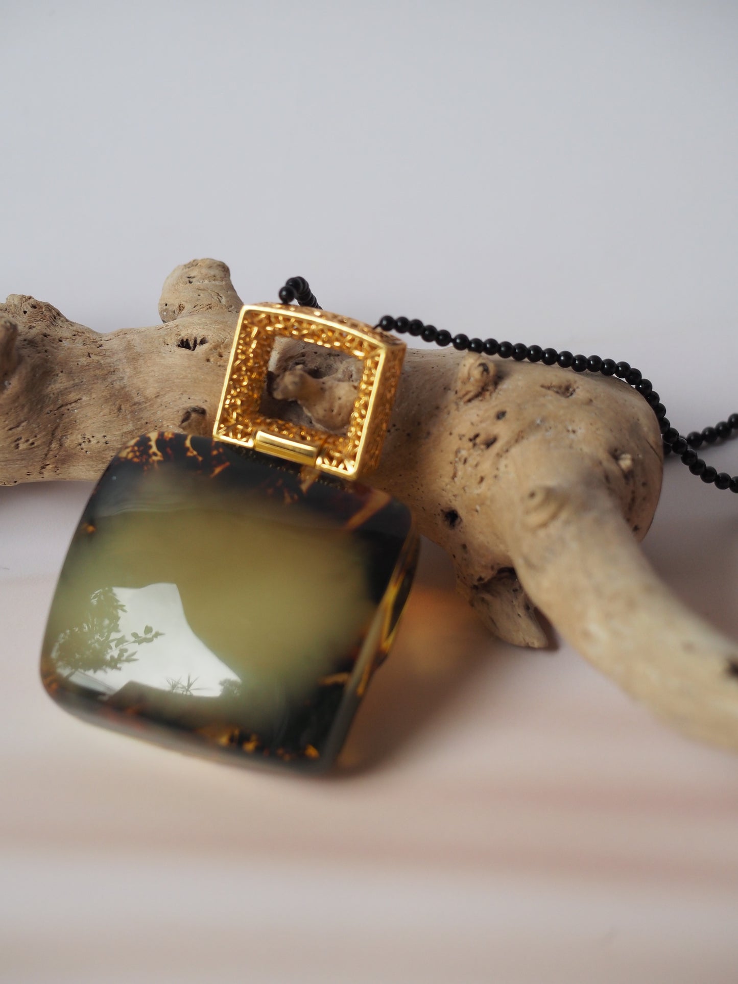 Huge Green Amber Necklace with Black Onyx Necklace and Gold Plated Frame