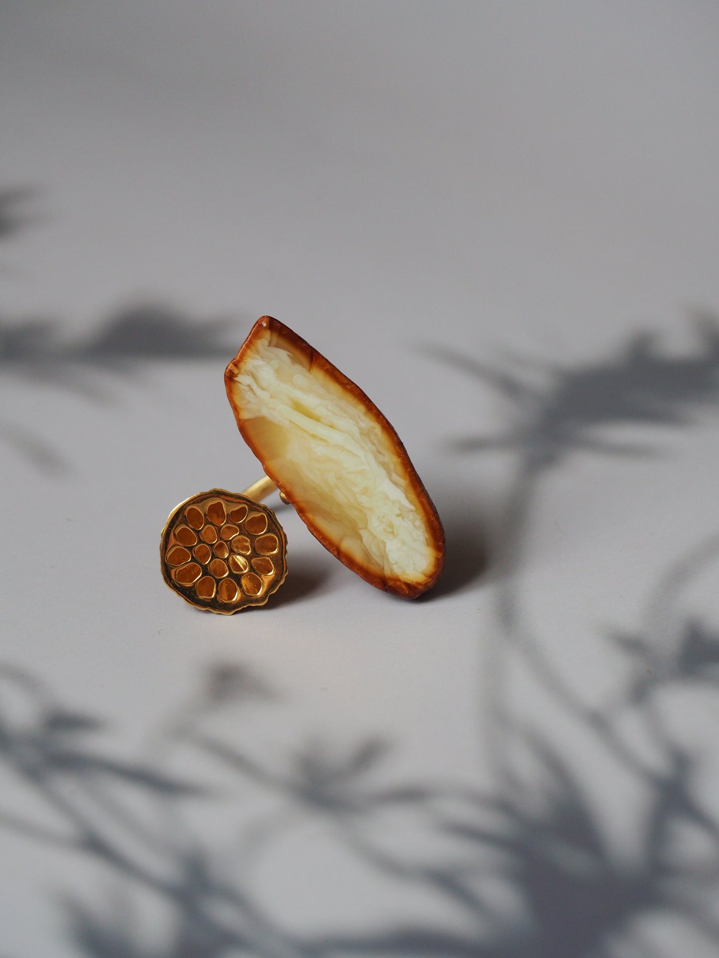 Unique Natural Amber Honeycomb Ring with Lotus Flower Pod and Matt Finish Gold Plated Silver