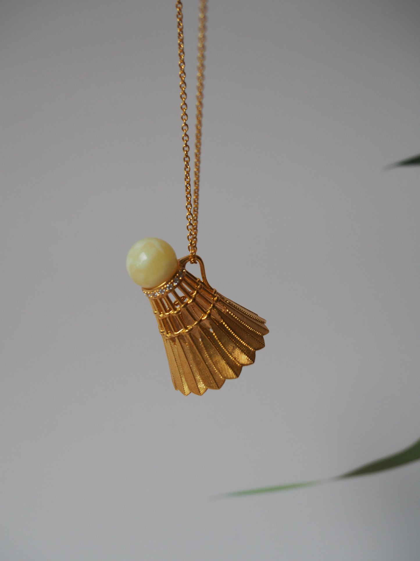 Feather Shuttlecock Shaped Natural Royal White Amber Pendant with Gold Plated Silver