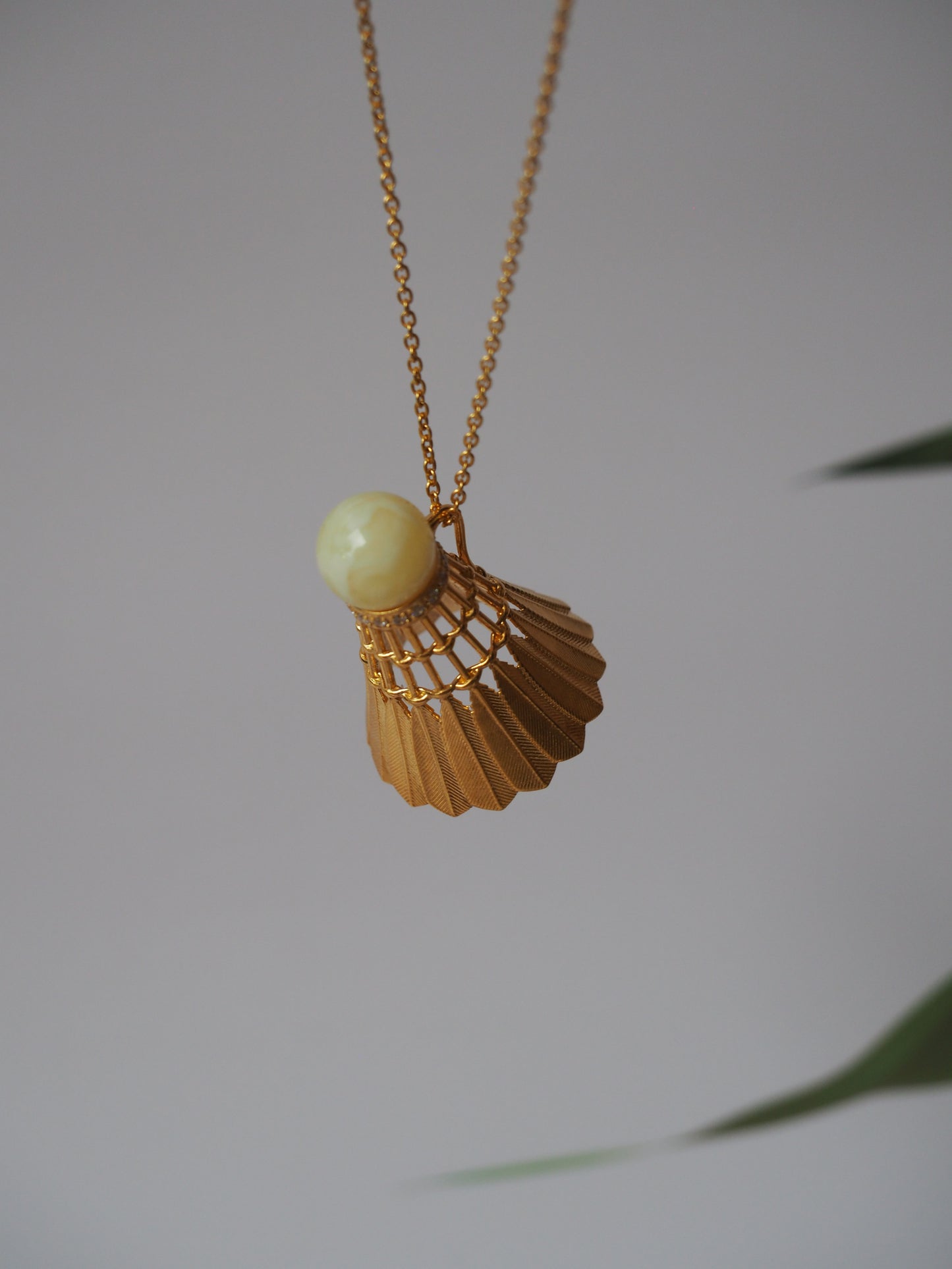 Feather Shuttlecock Shaped Natural Royal White Amber Pendant with Gold Plated Silver