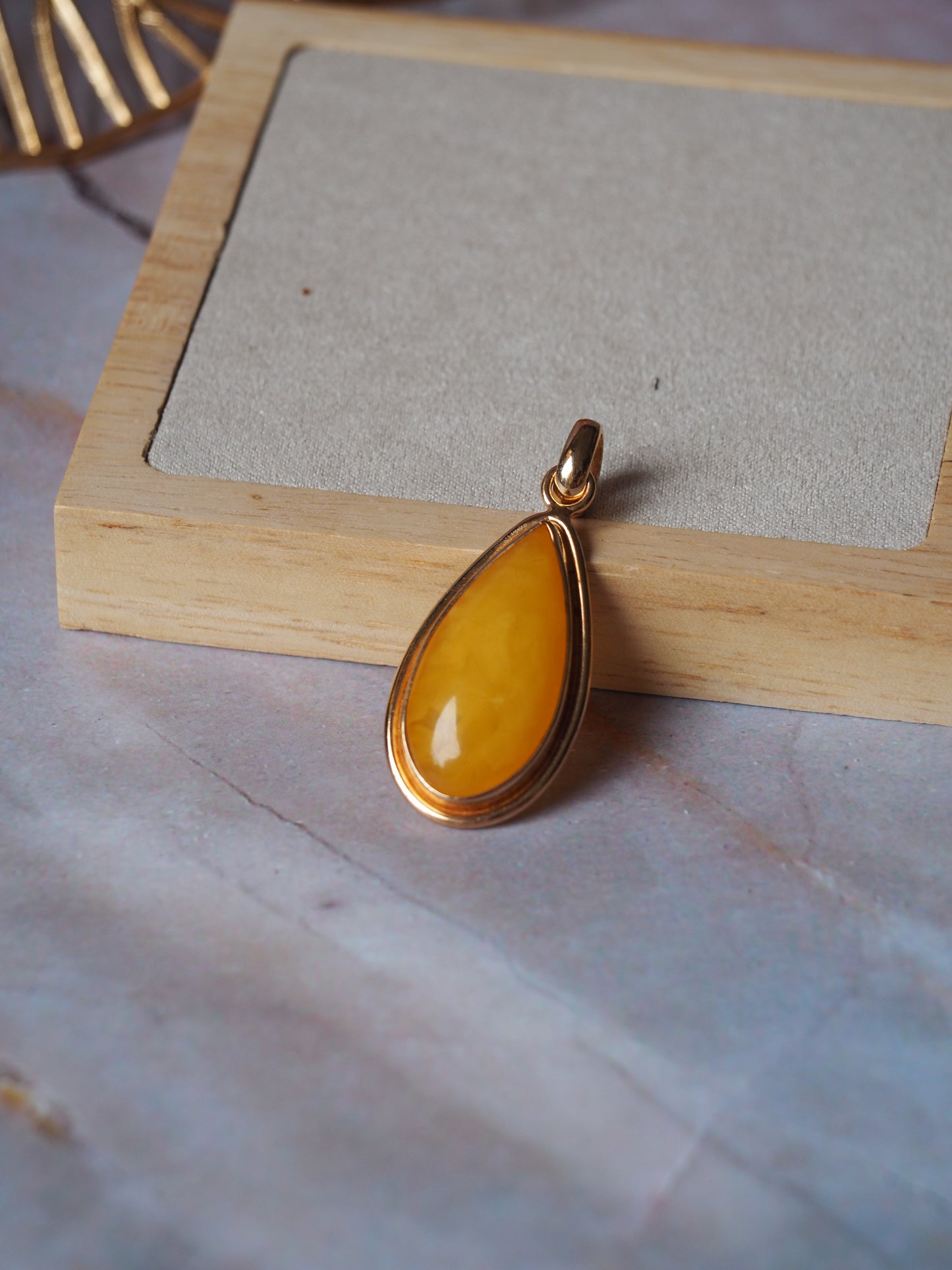Honey Amber Tear Drop Shape Pendant in Rose Gold Plated Silver Frame