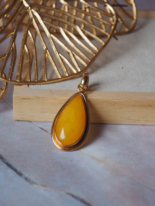 Honey Amber Tear Drop Shape Pendant in Rose Gold Plated Silver Frame