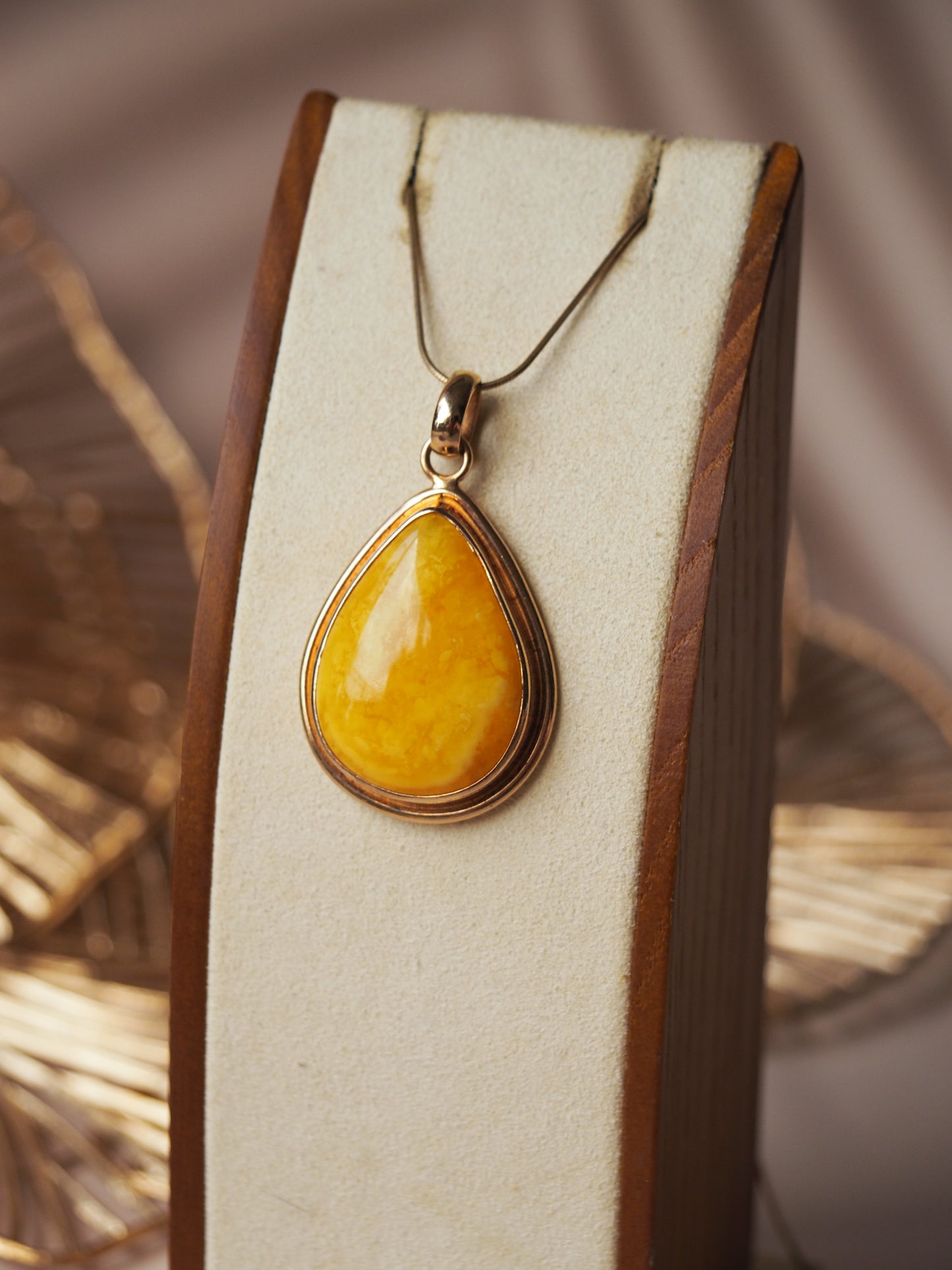 Natural Butterscotch Amber Tear Drop Shape Pendant in Rose Gold Plated Silver