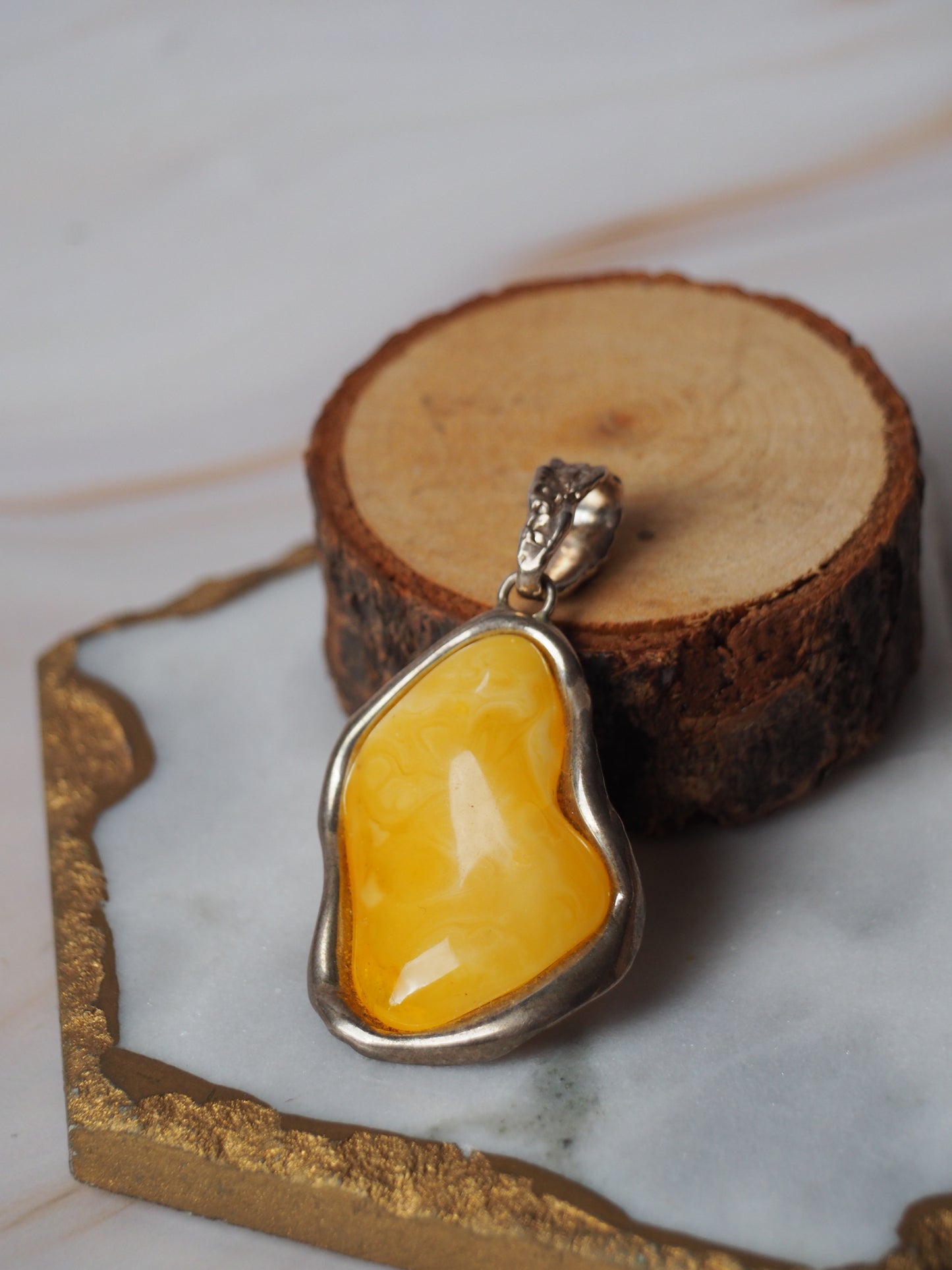 Irregular Natural Butterscotch Amber in Silver with Raw Back