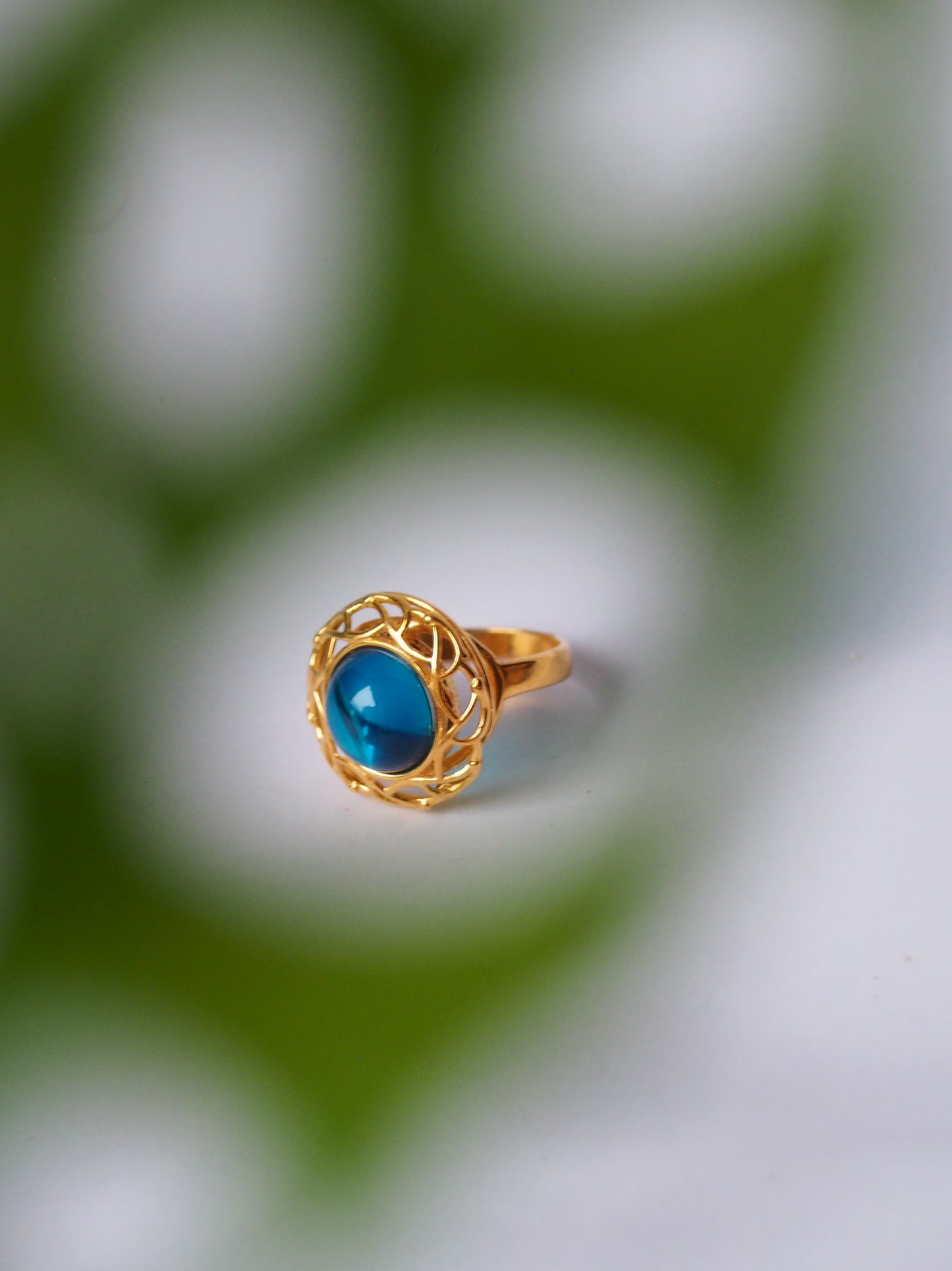 Round Blue Amber Ring in Gold Plated Silver