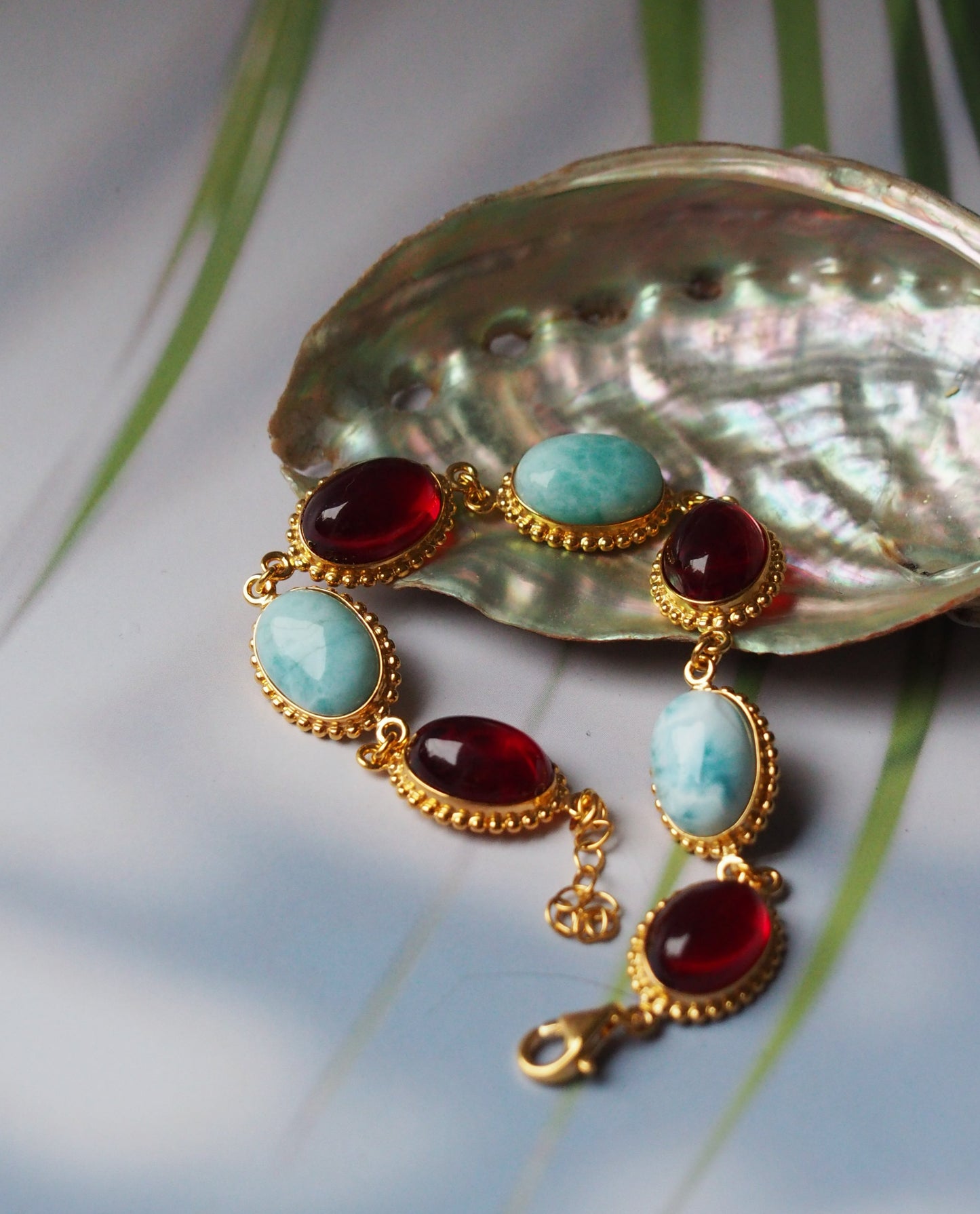 Red Amber and Larimar Bracelet in Gold Plated Silver