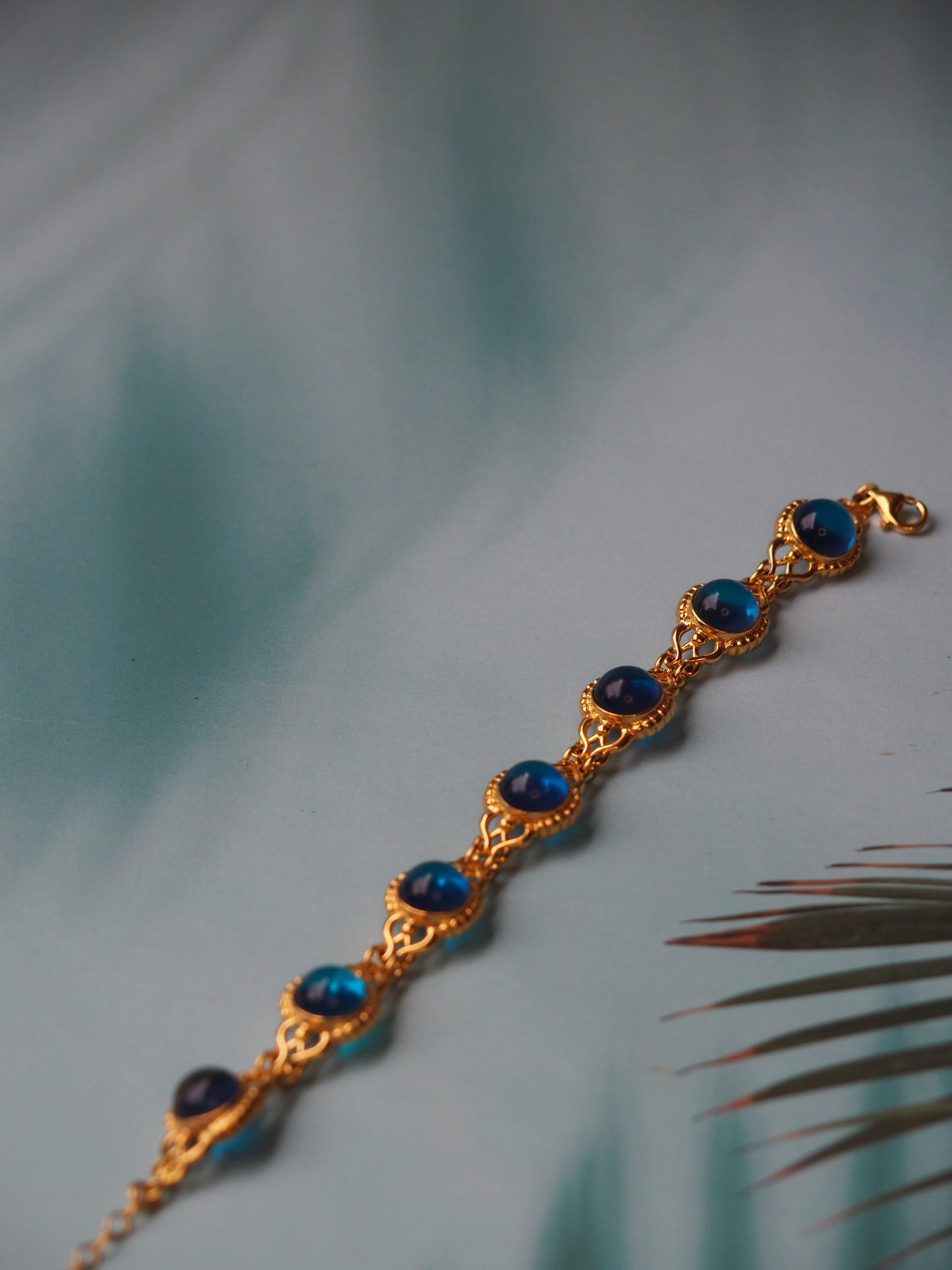 Blue Amber Round Bracelet in Gold Plated Silver
