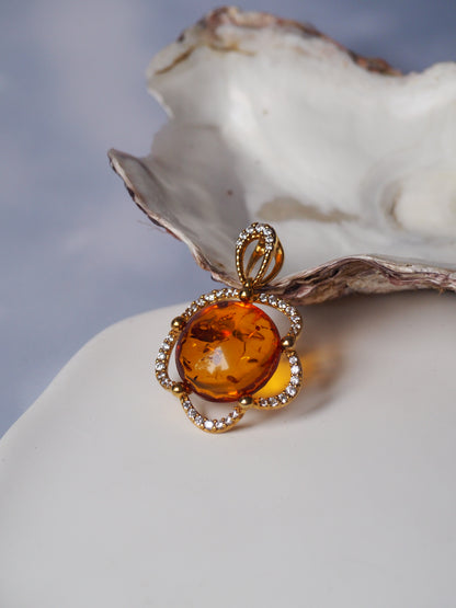 Delicate Flower Shaped Cognac Amber Pendant with Cubic Zirconia in Gold Plated Silver