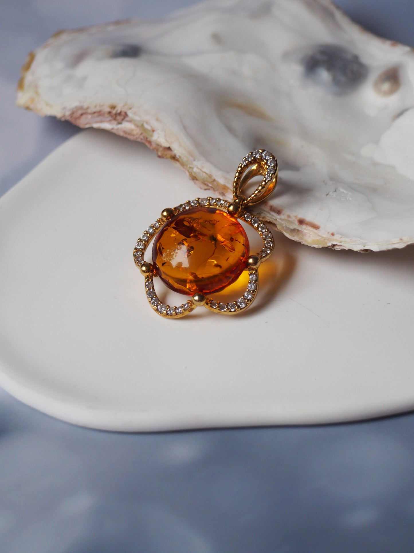 Delicate Flower Shaped Cognac Amber Pendant with Cubic Zirconia in Gold Plated Silver