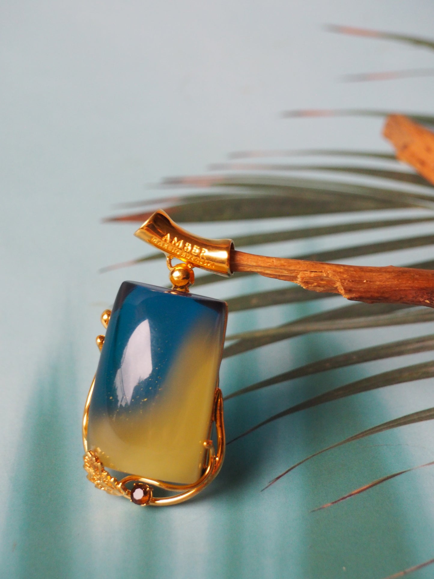 Big Unique Blue Amber Rectangle Pendant with Milk Inclusion in Gold Plated Silver