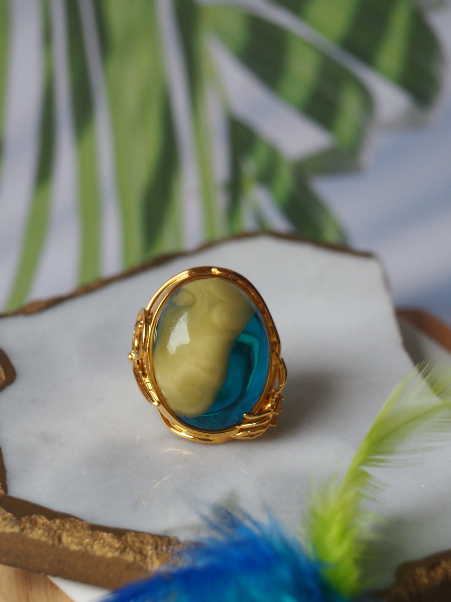 Unique Blue Amber Ring with Milk Inclusion in Gold Plated Silver