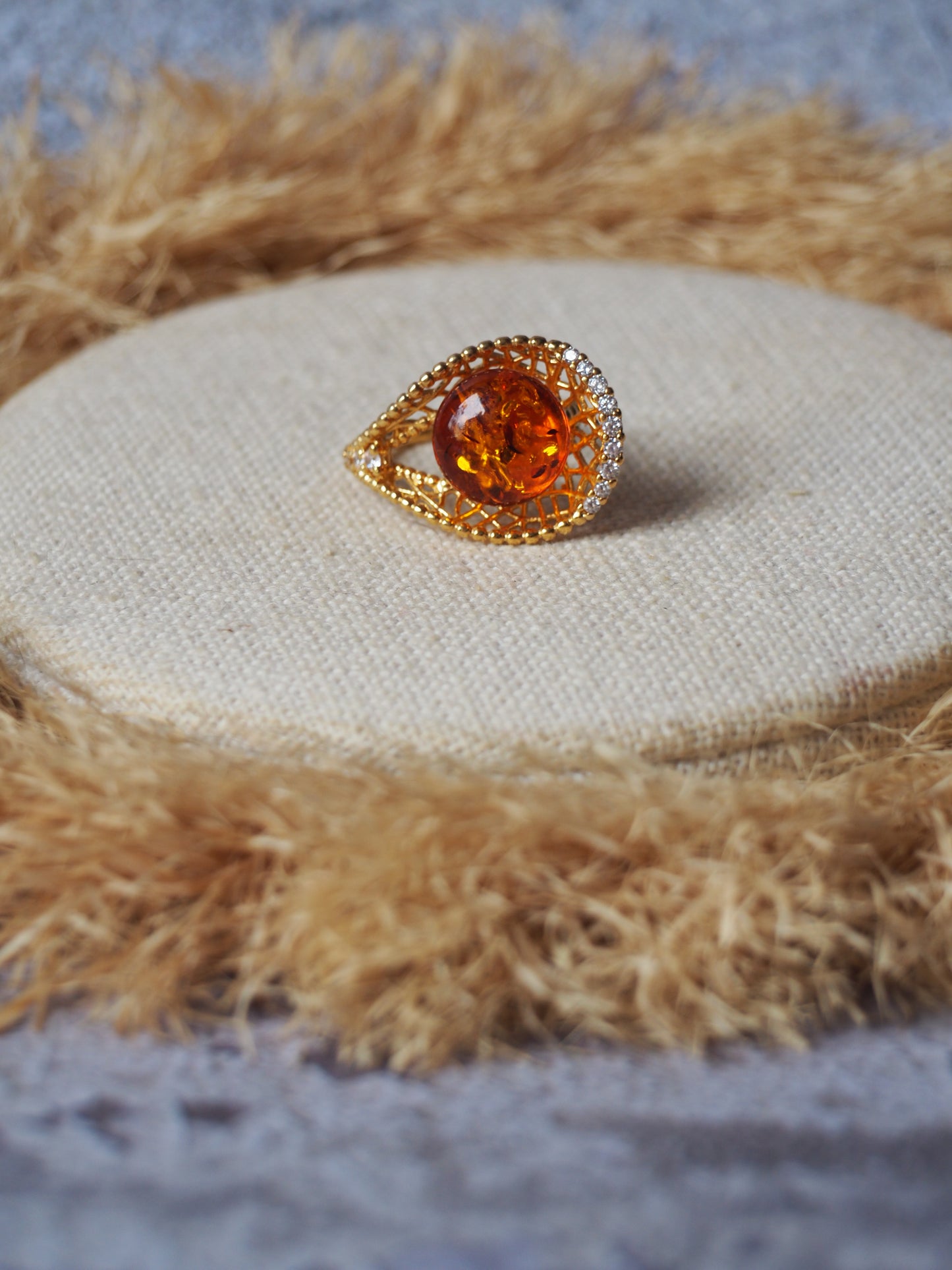 Tear Shaped Cognac Amber Adjustable Ring in Gold Plated Silver with Zirconias