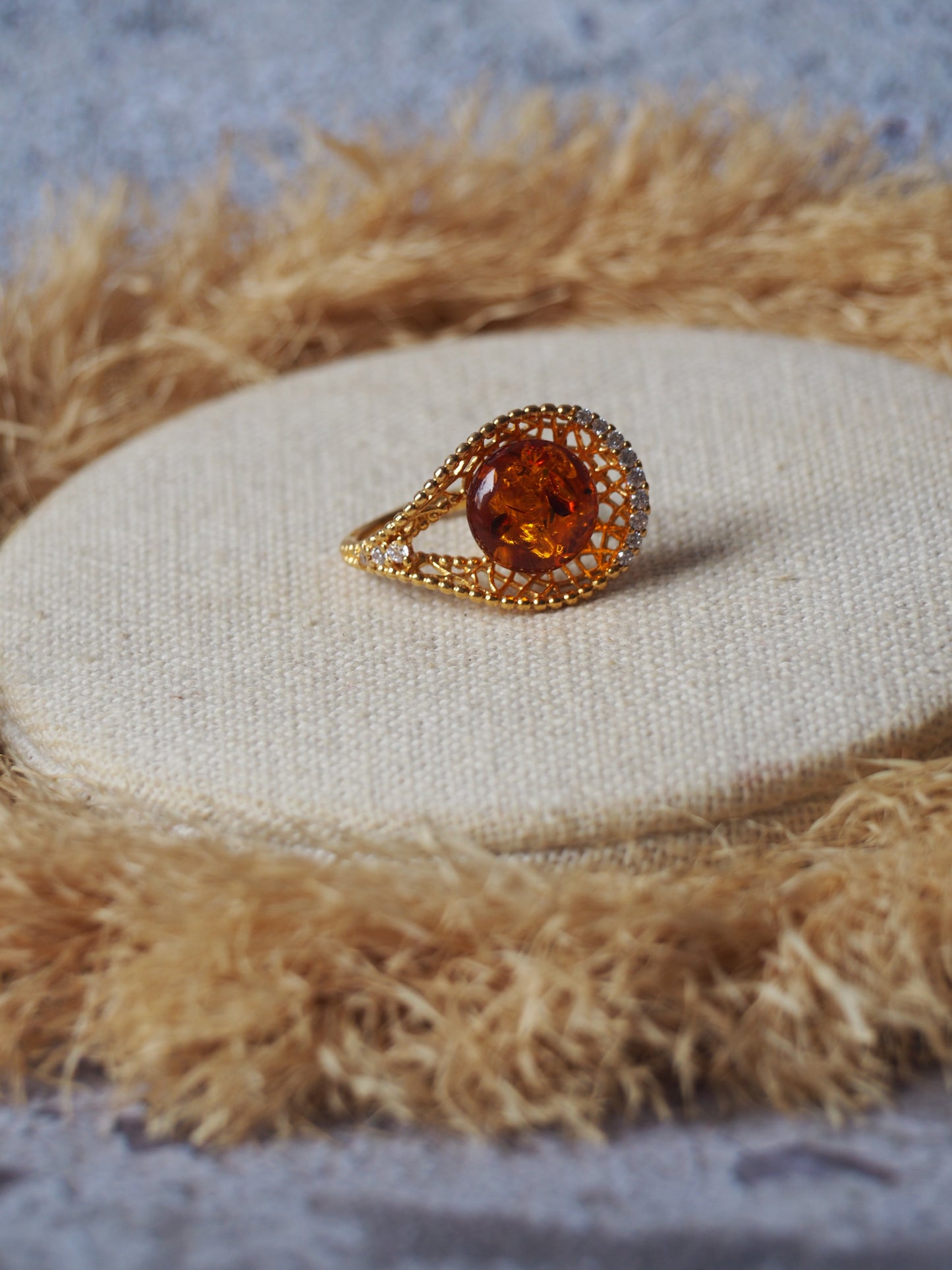 Tear Shaped Cognac Amber Adjustable Ring in Gold Plated Silver with Zirconias