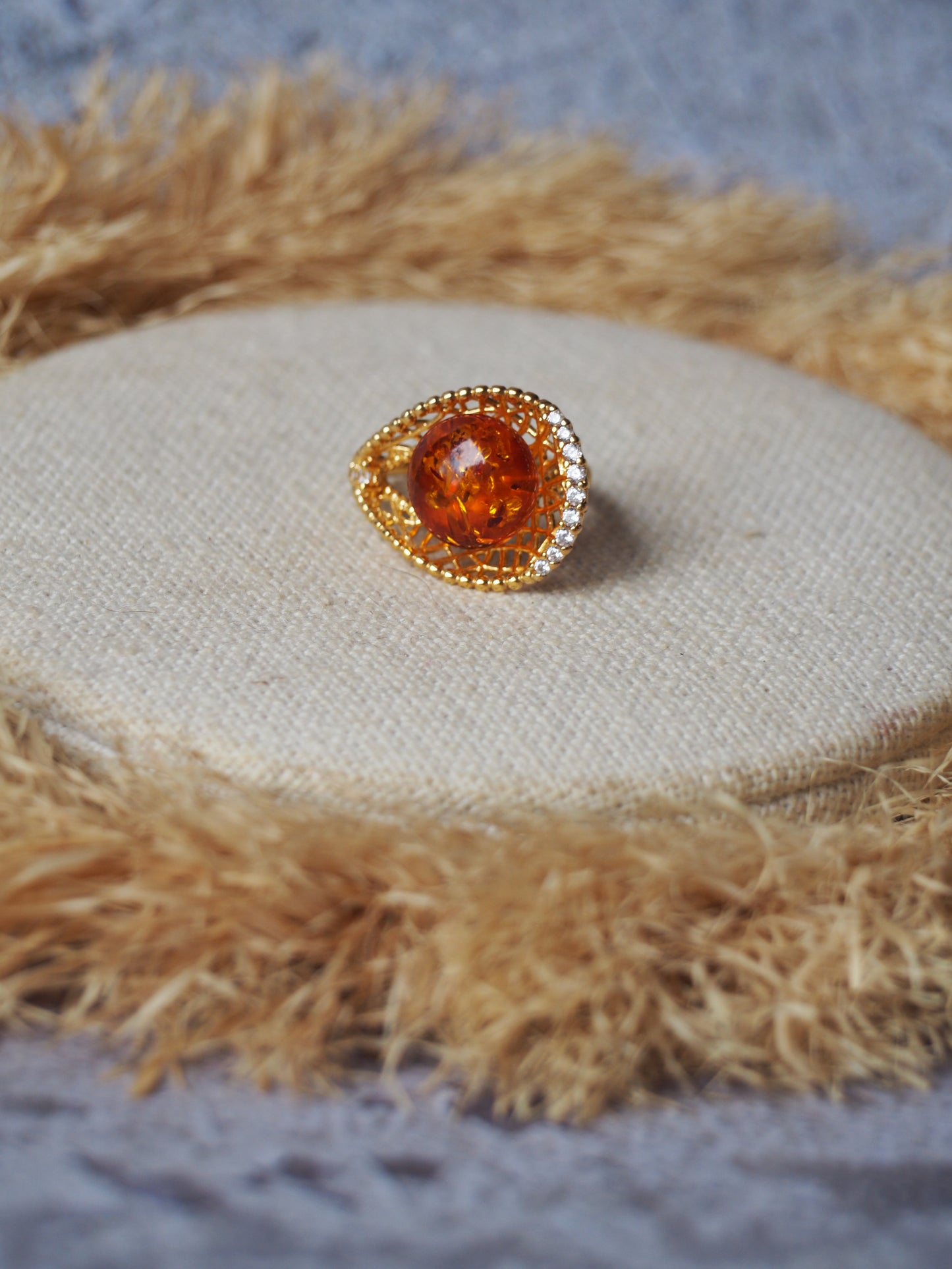 Tear Shaped Cognac Amber Adjustable Ring in Gold Plated Silver with Zirconias