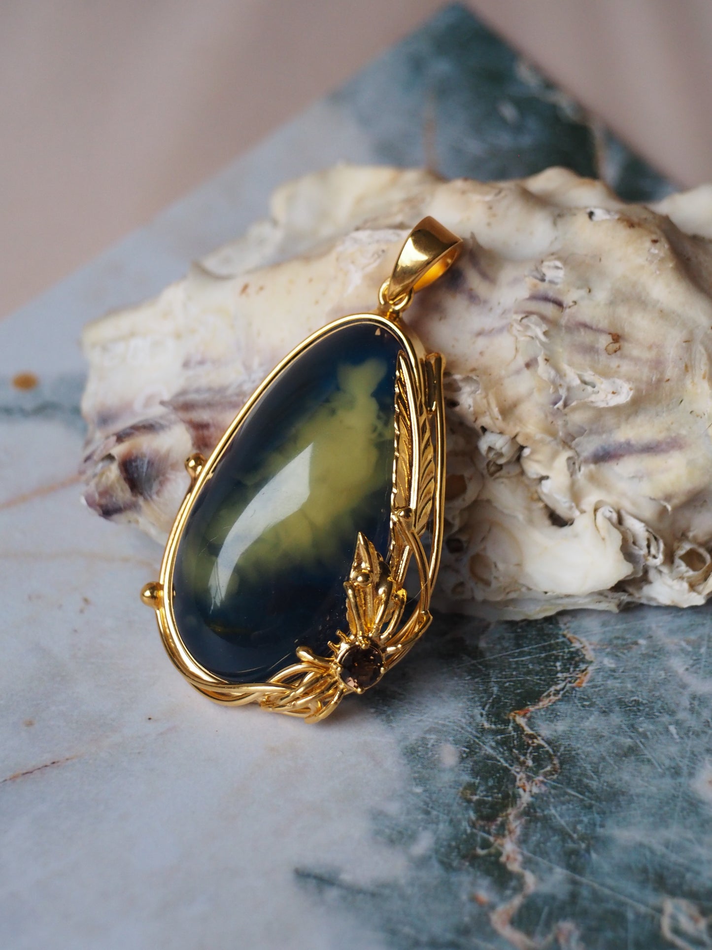 Unique Blue Amber Pendant with Milk Inclusion and Amethyst in Gold Plated Silver