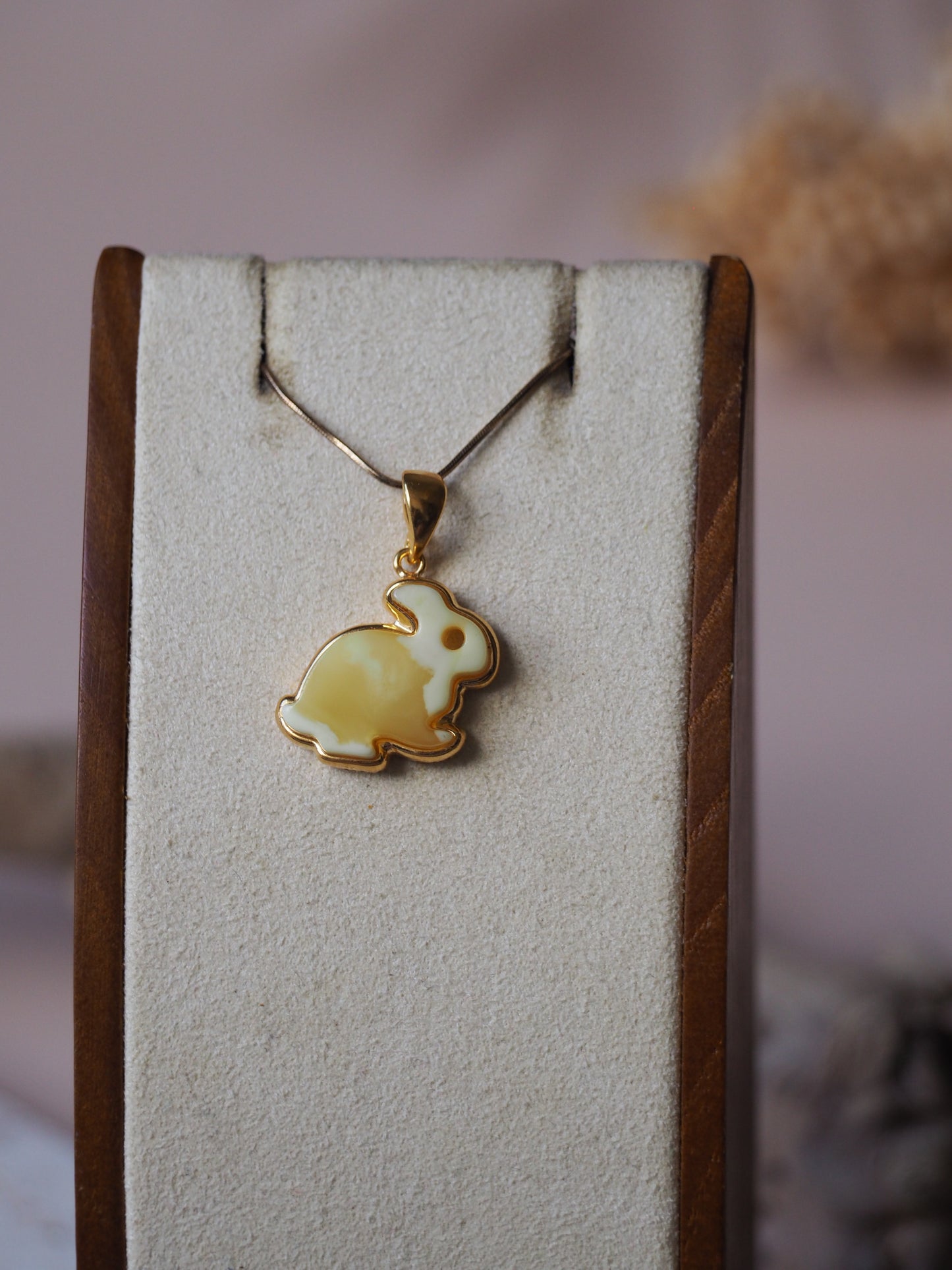 Milk/ Butterscotch Amber Rabbit Charm/ Pendant in Gold Pleated Silver