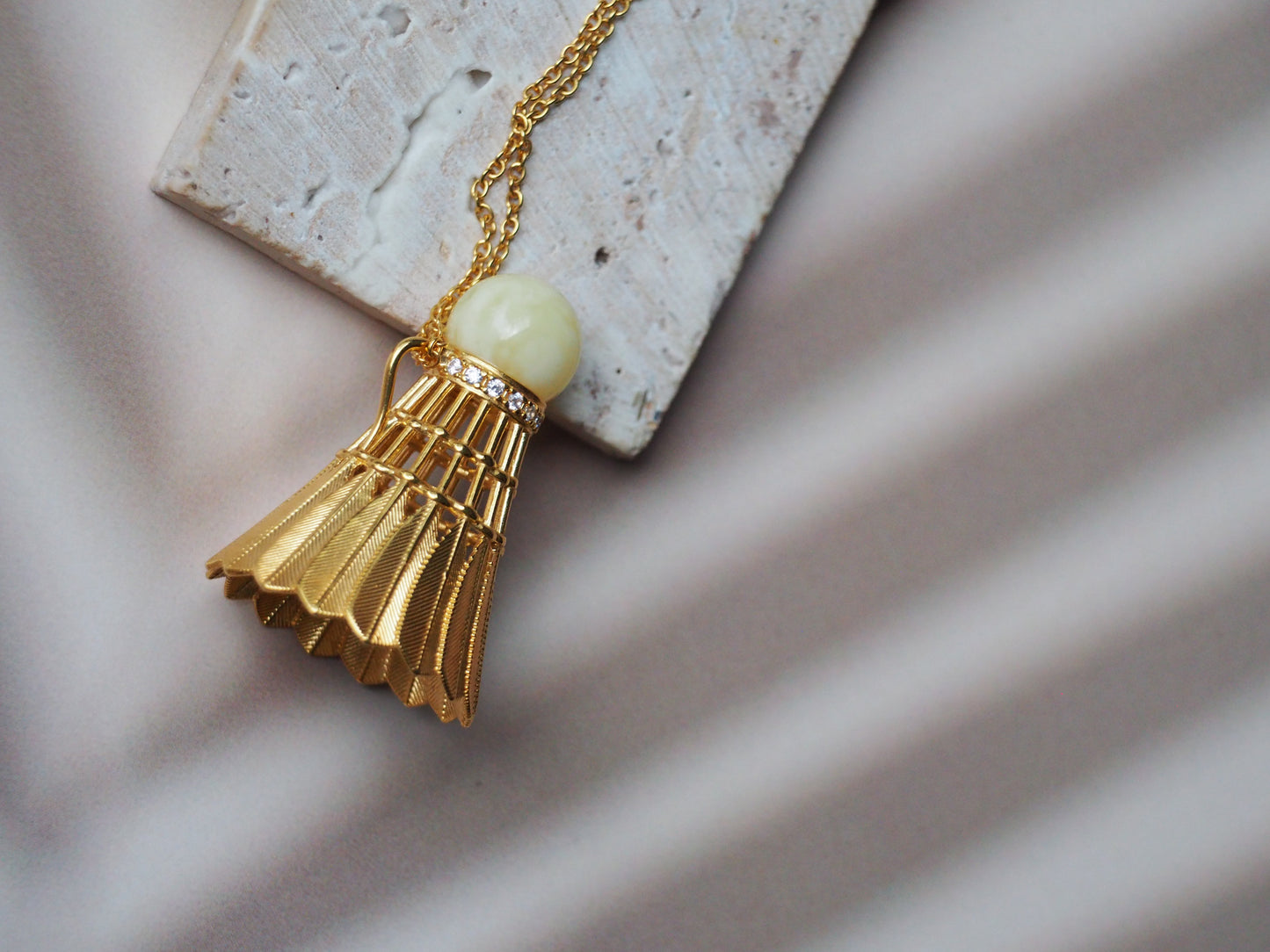 Feather Shuttlecock Shaped Natural Royal White Amber Pendant with Gold Plated Silver