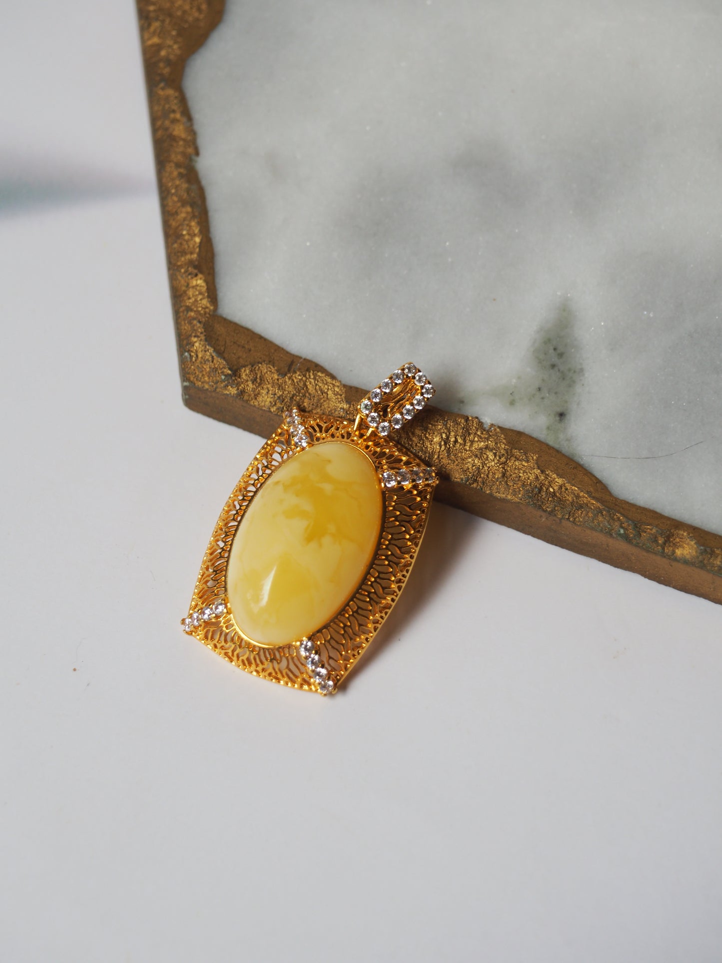 Rectangular Butterscotch Amber Set with Cubic Zirconias in Gold Plated Silver