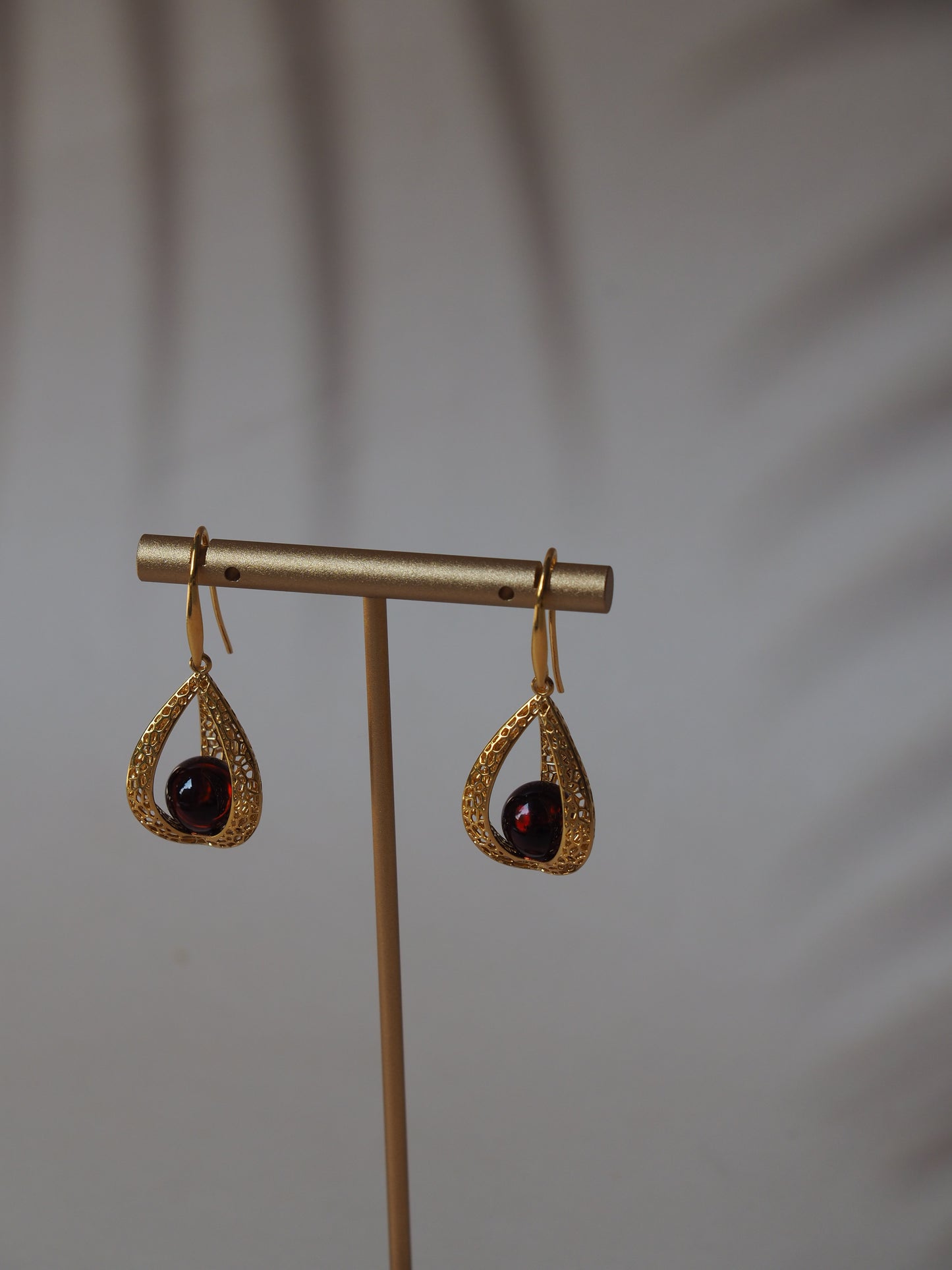 Triangle Cherry Amber Dangling Earrings with Gold Plated Silver Frame