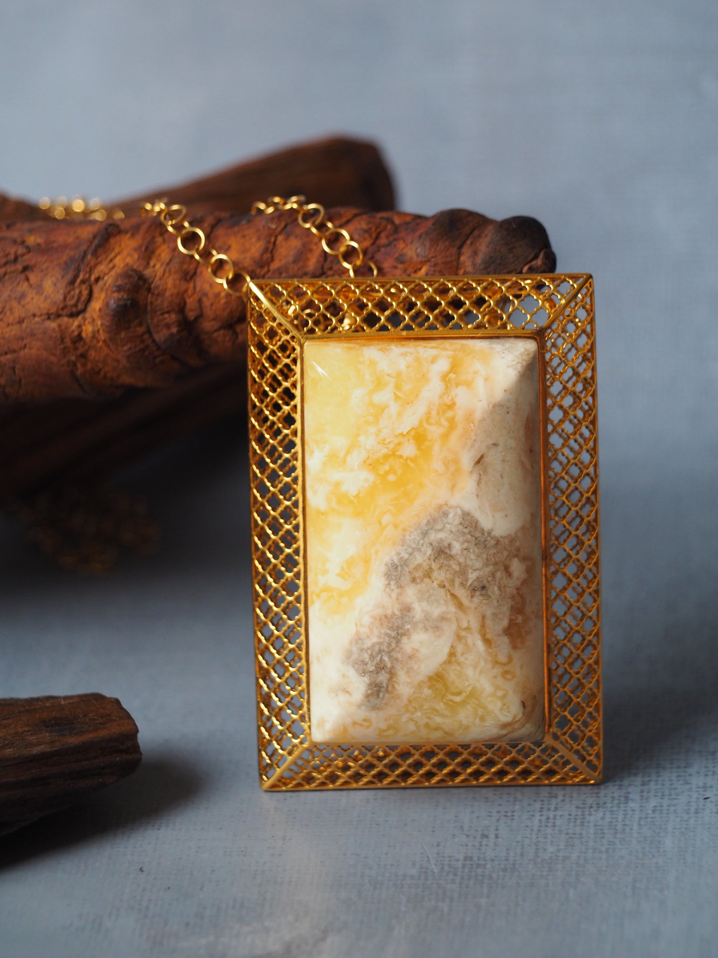 Unique Large Royal White Rectangular Amber Pendant with Gold Plated Silver Frame And Chain