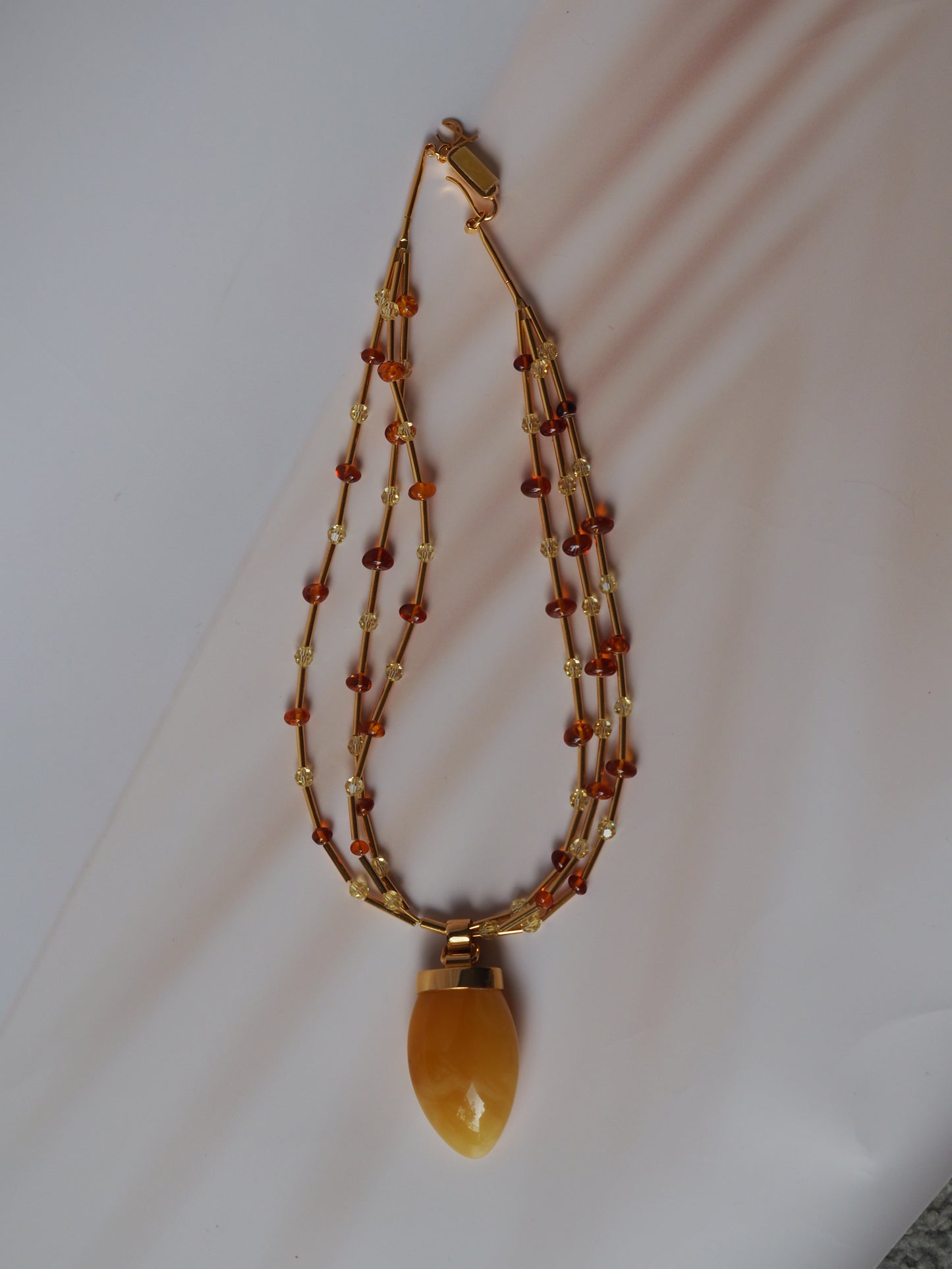 Unique Claw Shaped Butterscotch / Honey Amber Necklace With Gold Plated Silver and Swarovski Crystals