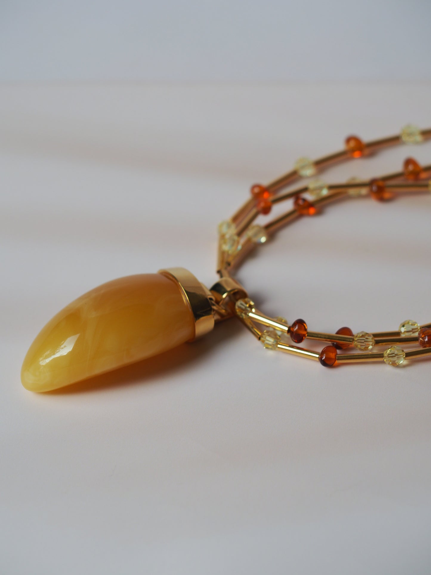 Unique Claw Shaped Butterscotch / Honey Amber Necklace With Gold Plated Silver and Swarovski Crystals