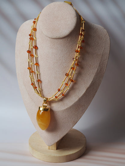 Unique Claw Shaped Butterscotch / Honey Amber Necklace With Gold Plated Silver and Swarovski Crystals