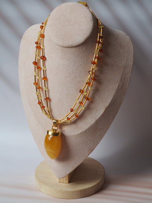 Unique Claw Shaped Butterscotch / Honey Amber Necklace With Gold Plated Silver and Swarovski Crystals