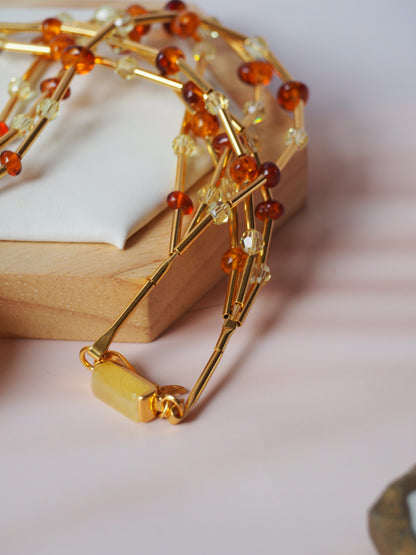 Unique Claw Shaped Butterscotch / Honey Amber Necklace With Gold Plated Silver and Swarovski Crystals