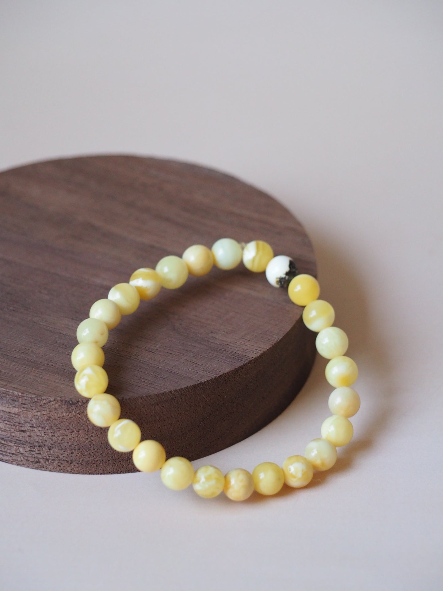 Unique Royal White Amber Beaded Bracelet with Black Inclusion
