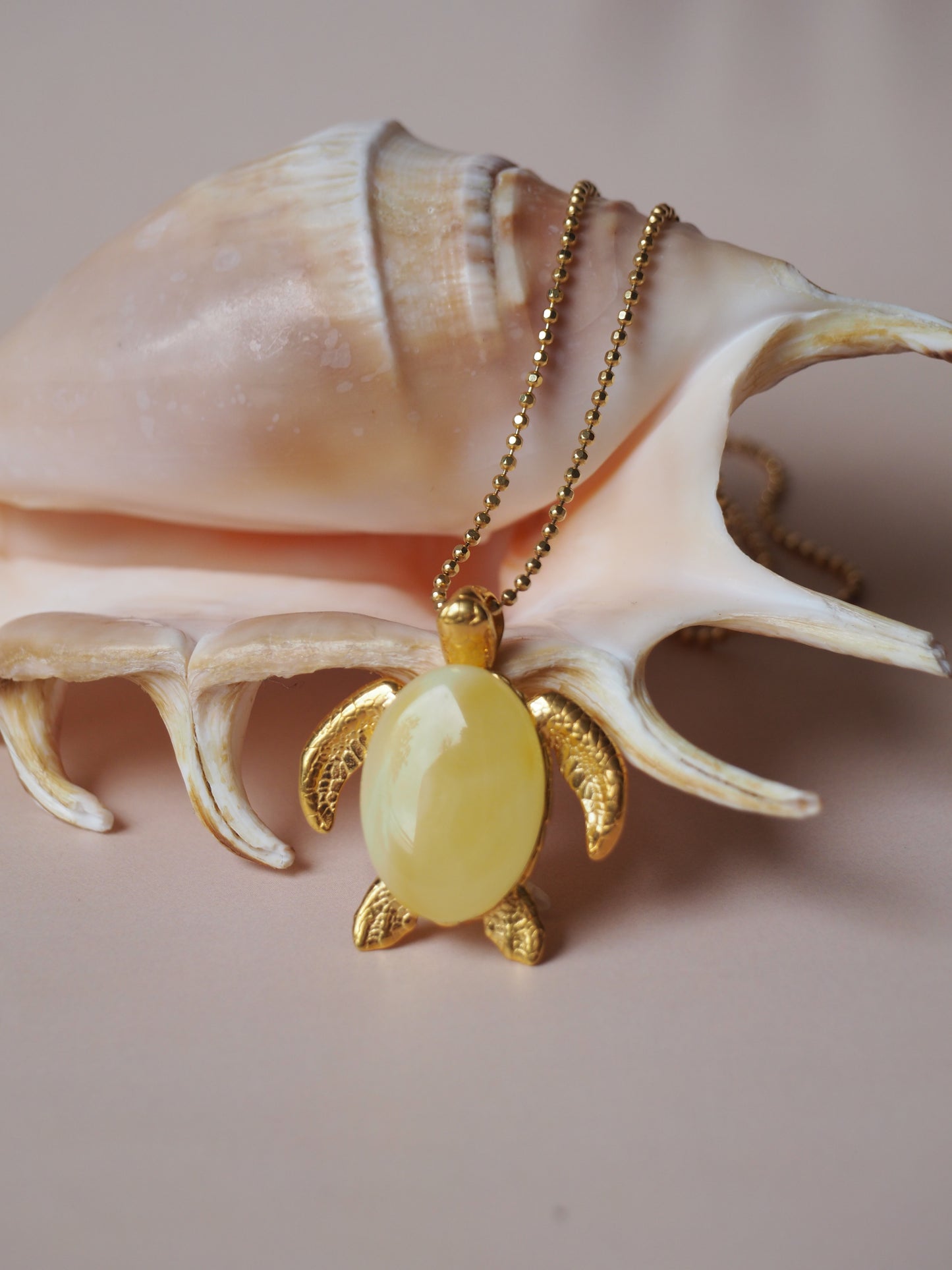 Butterscotch Amber Turtle Shape Pendant in Gold Plated Silver 925