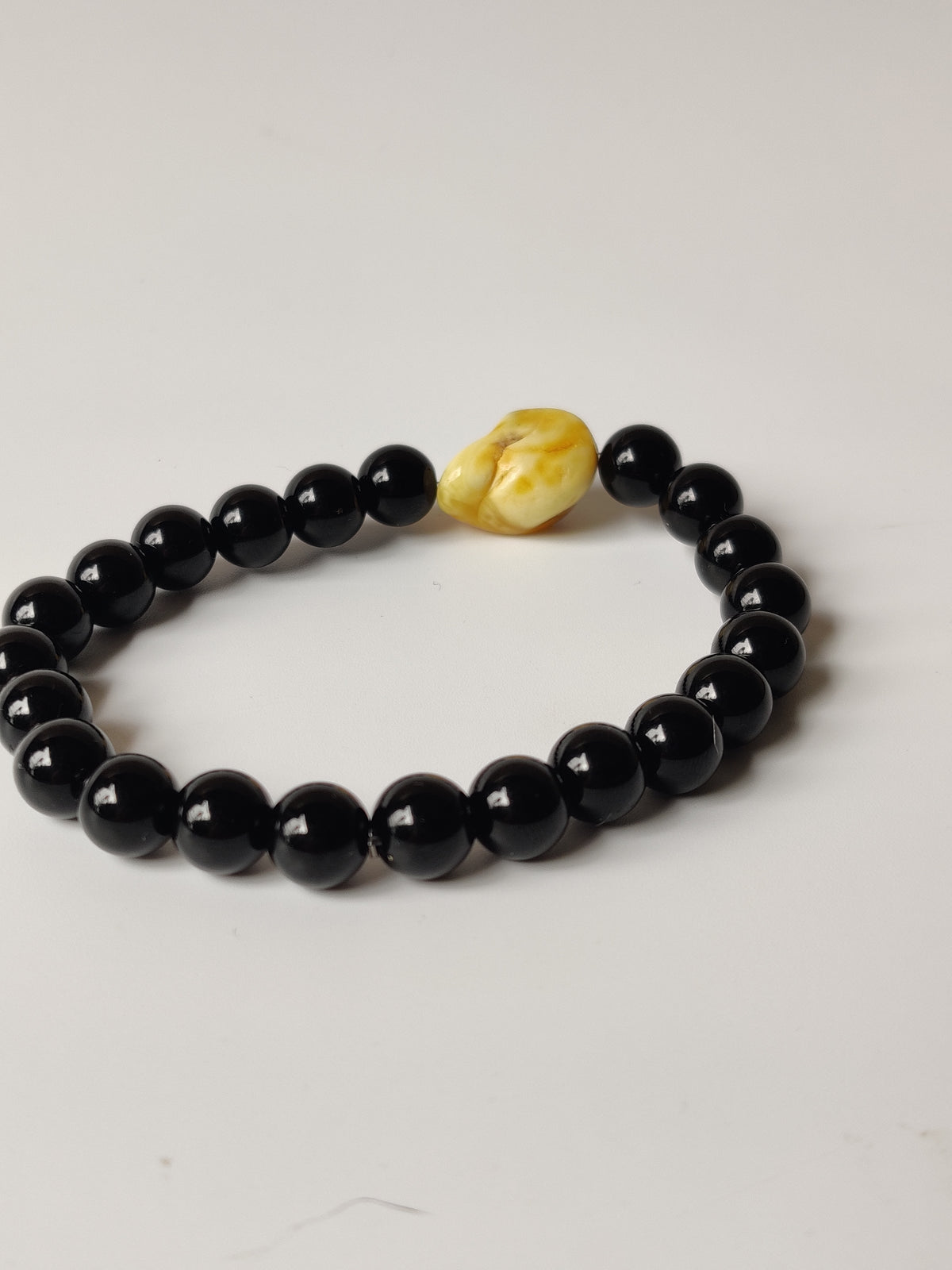 Black Onyx & Rare White Amber Bracelet
