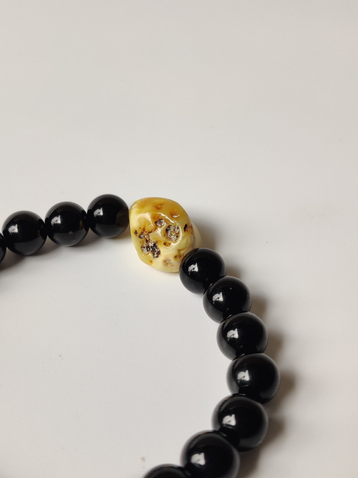Black Onyx & Rare White Amber Bracelet