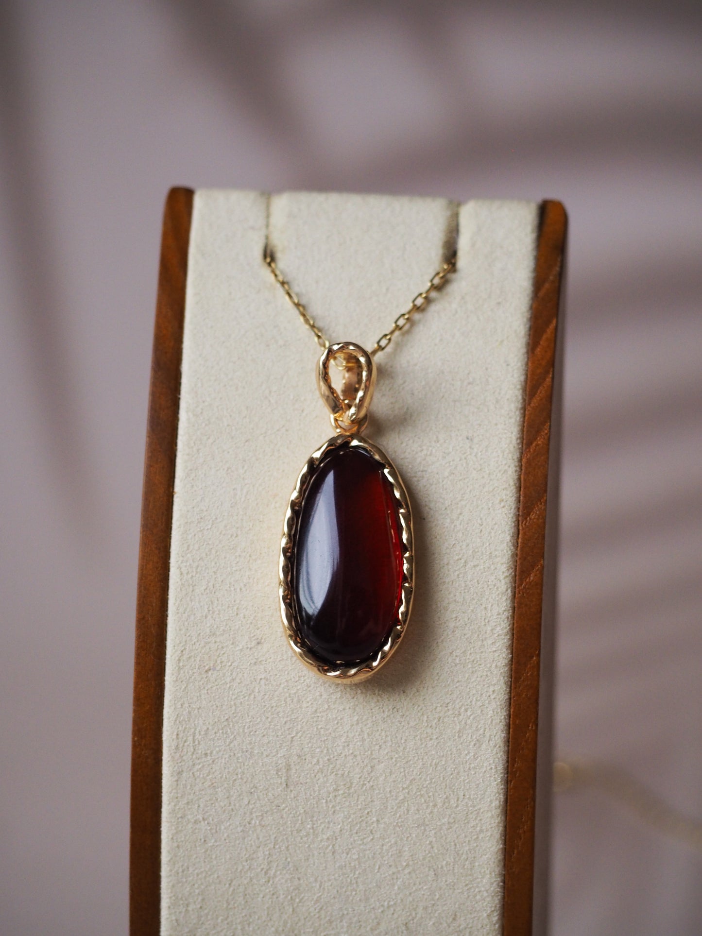 Cherry Amber Oval Pendant in Gold Pleated Silver