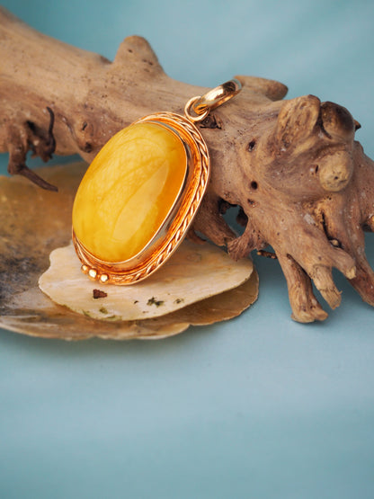 Butterscotch Amber Pendant in Rose Gold Pleated Silver Frame