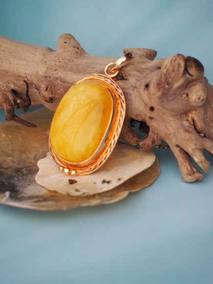 Butterscotch Amber Pendant in Rose Gold Pleated Silver Frame